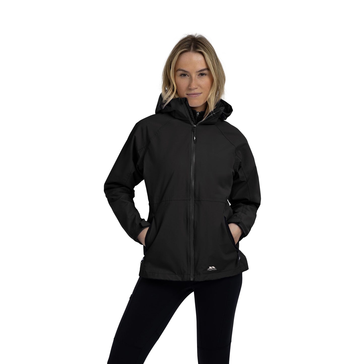 Person wearing a black waterproof jacket on a white background