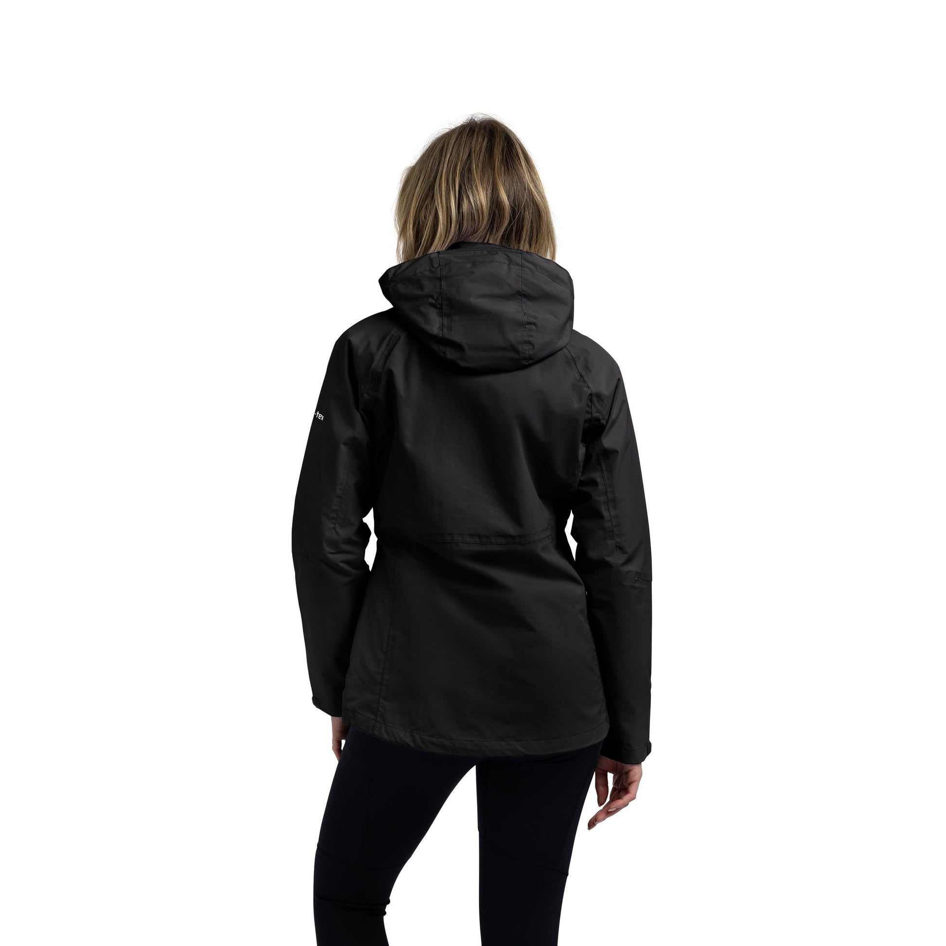 View from behind of Woman wearing a black jacket on a white background