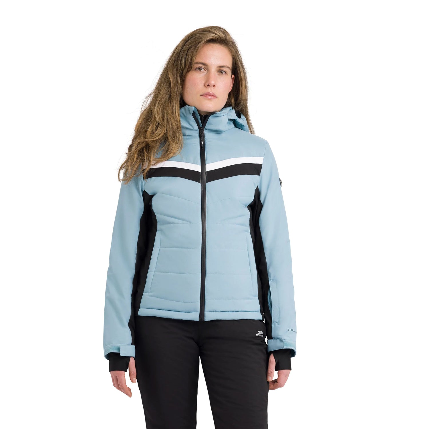 Woman wearing a light blue ski jacket  Emma with black and white accents on a white background
