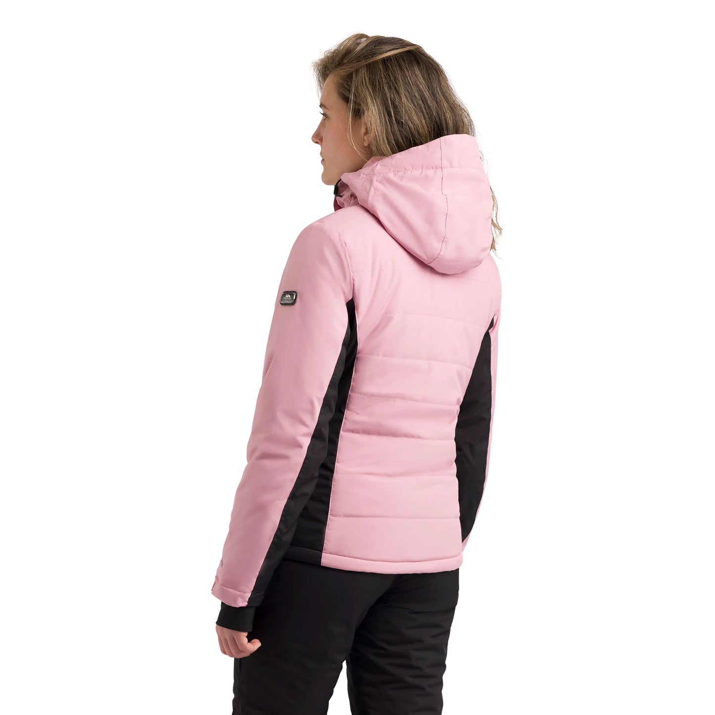 Side and back view of woman wearing a pink and black ski jacket on a white background