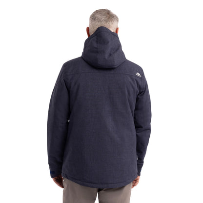 Man wearing the Fyfinn padded jacket in Navy Marl with the hood up, back view