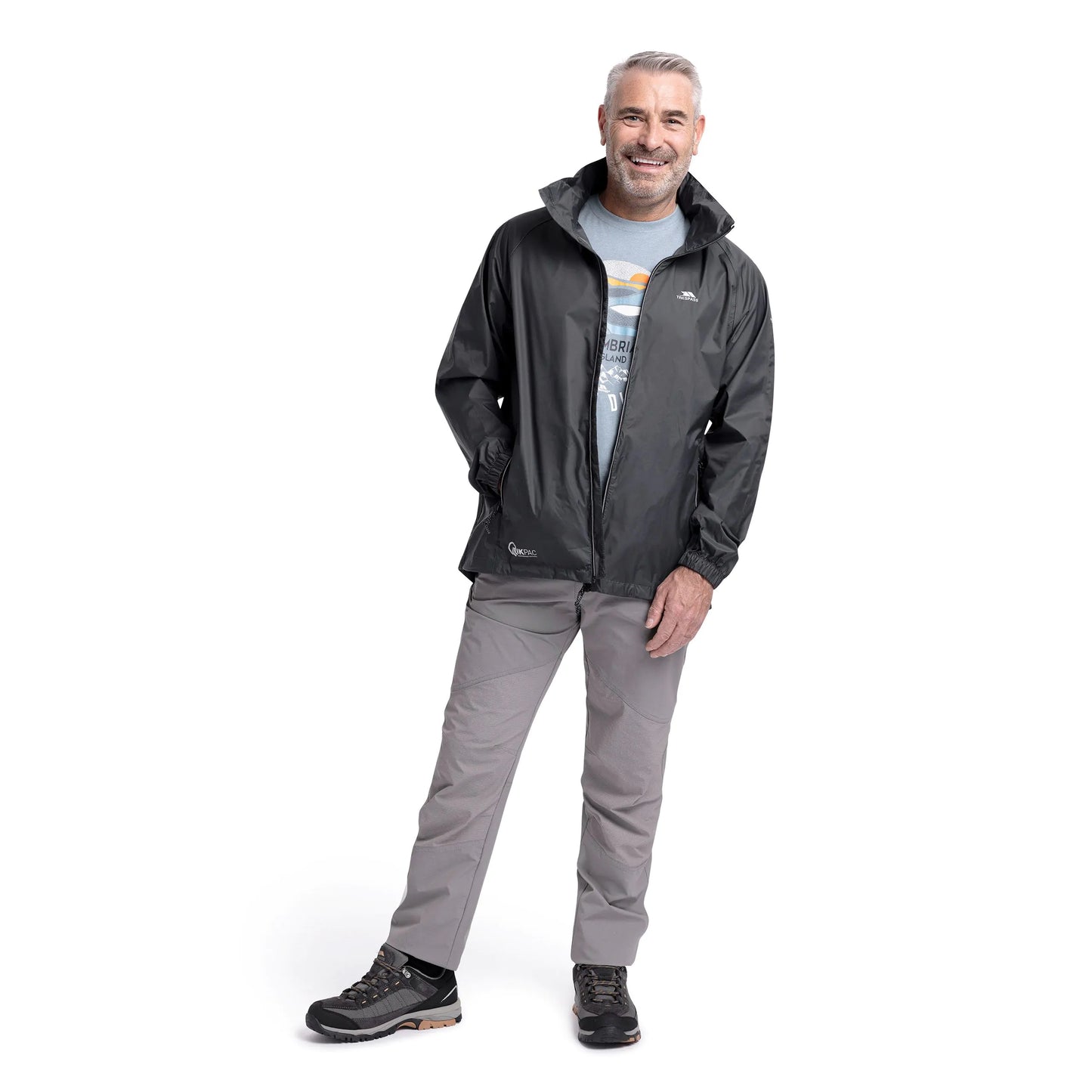 Man wearing a gray raincoat and pants on a white background